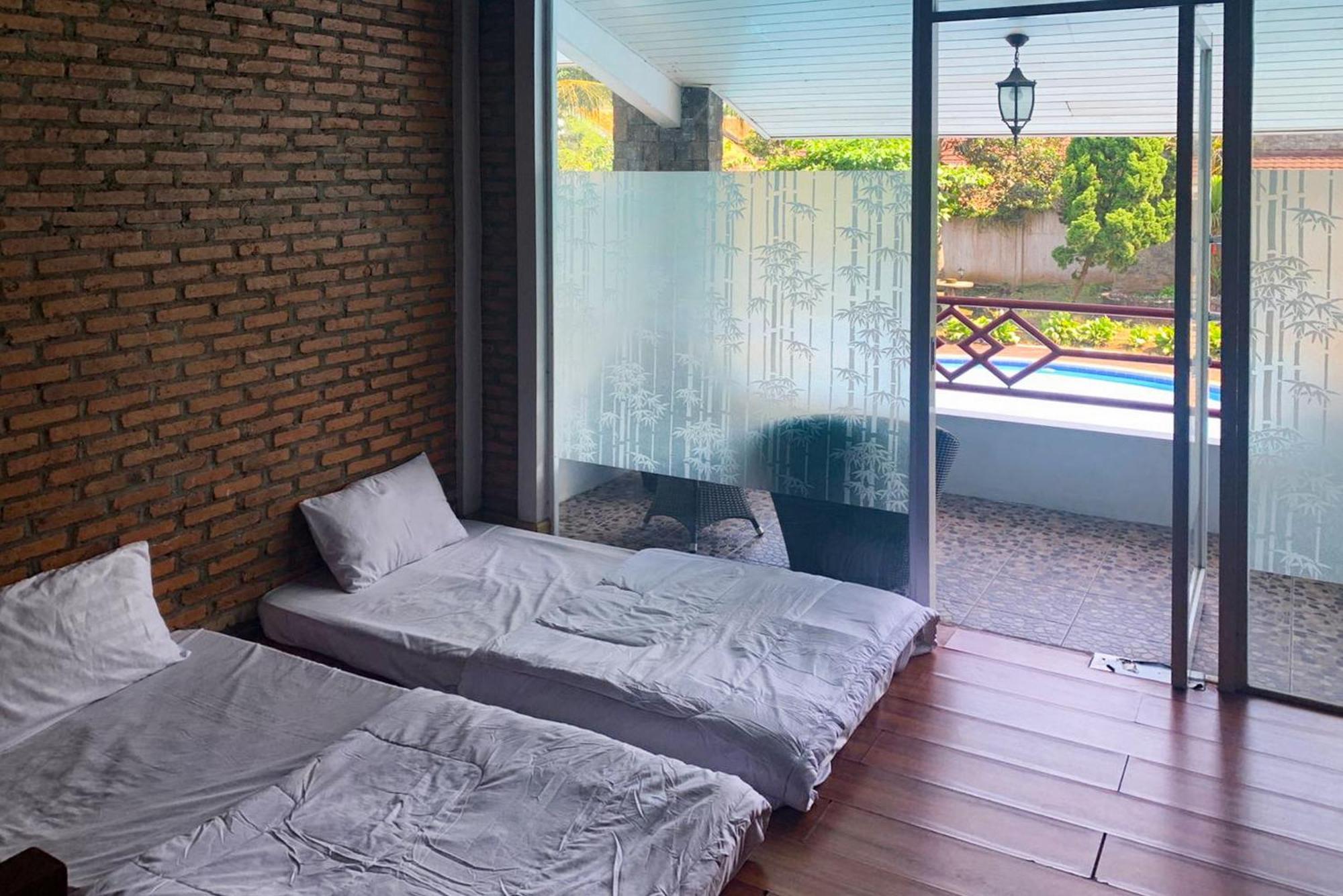 Urbanview Hotel Villa Q Gisting Bandjarnegeri Exterior foto